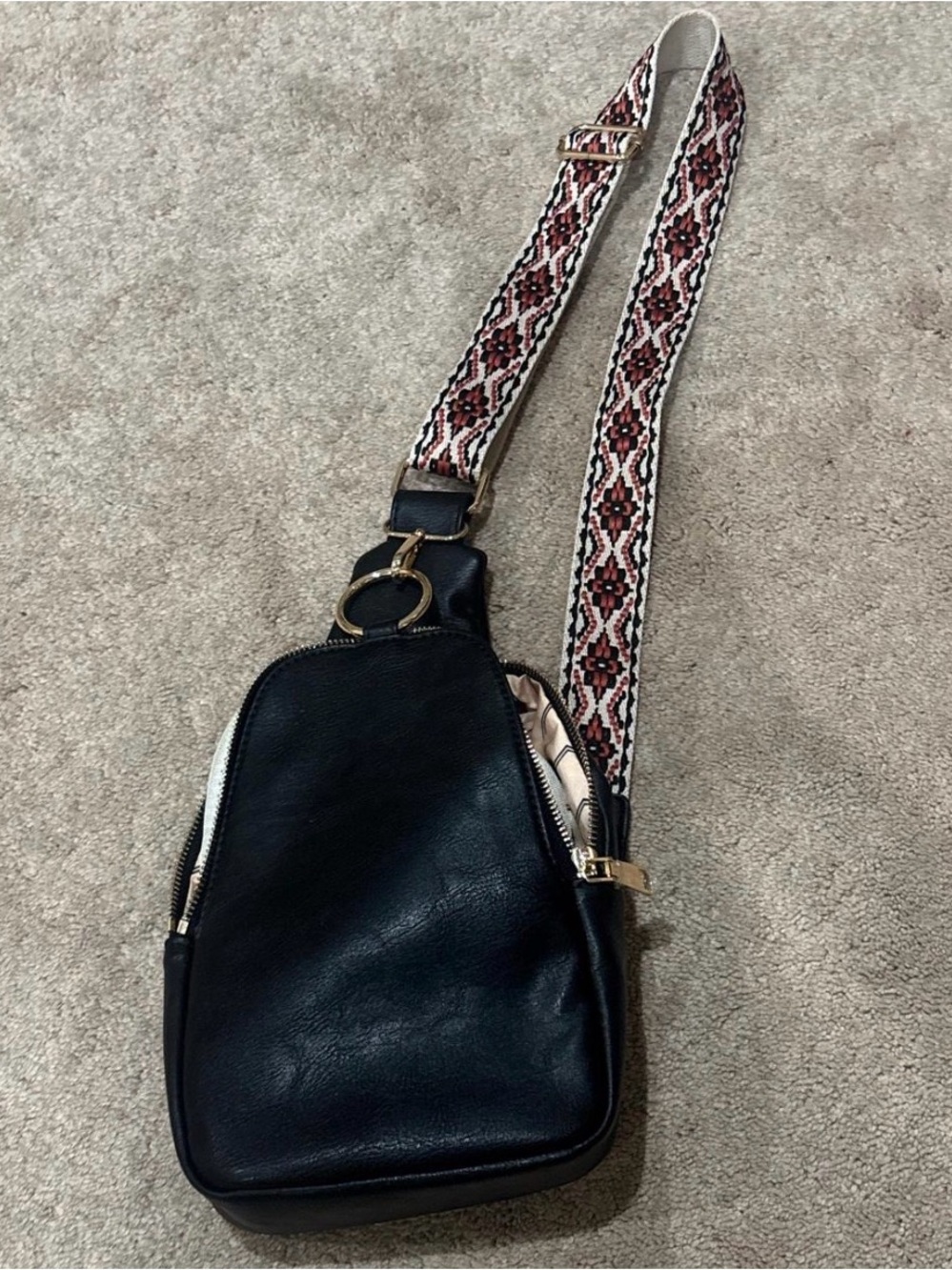 Black Sling Crossbody Bag with
Woven Strap